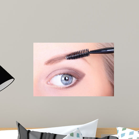 Beautiful Woman Brushing Eyebrows Wall Mural