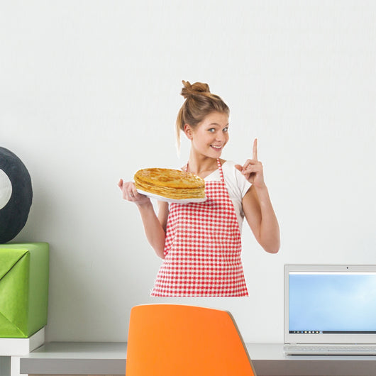 Beautiful young girl with pancakes Wall Decal