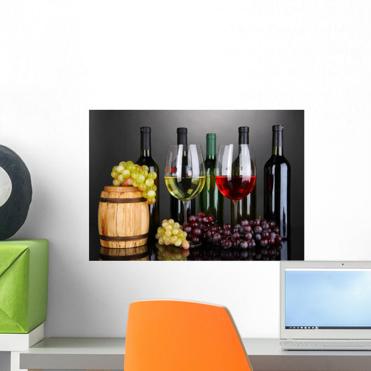 Assortment of wine in glasses and bottles on grey background Wall Mural