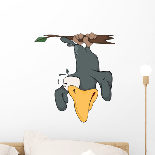 Raven hanging up feet on a branch Wall Decal