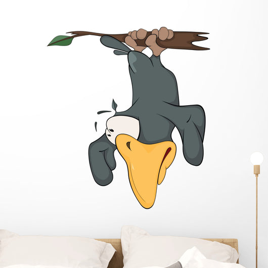 Raven hanging up feet on a branch Wall Decal