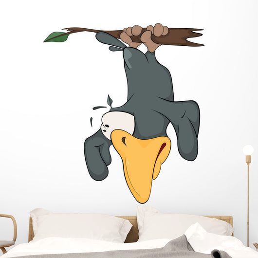 Raven hanging up feet on a branch Wall Decal