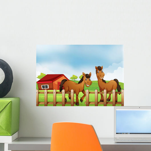 Horses inside Wooden Fence