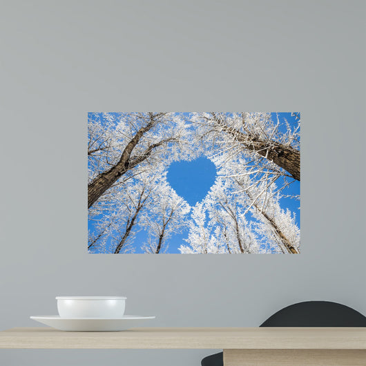 Winter landscape,branches form a heart-shaped pattern Wall Mural