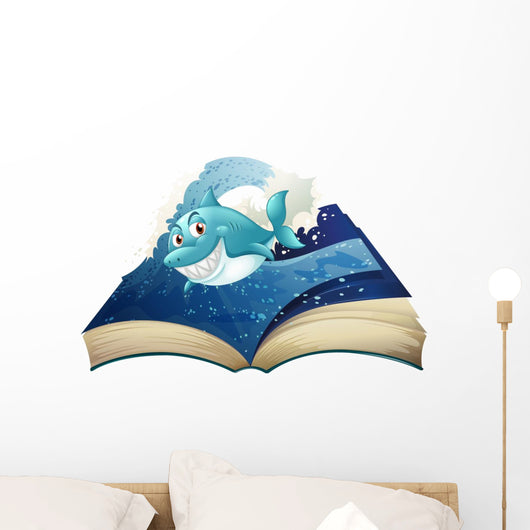 A Book with a Smiling Blue Shark and Waves Wall Decal