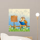 An owl reading a book beside a wooden signboard Wall Mural