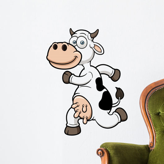 Vector illustration of a running cow cartoon Wall Decal