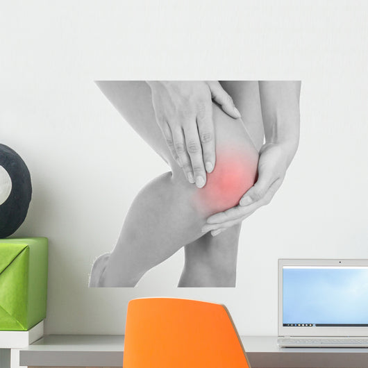 Woman having leg injury Wall Mural