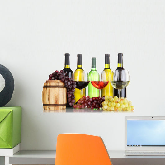 Assortment of wine in glasses and bottles isolated on white Wall Mural