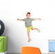 little boy in striped T-shirt dancing. Wall Decal