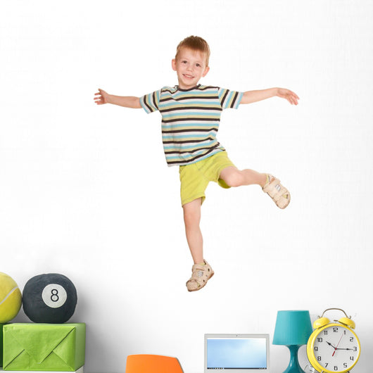 little boy in striped T-shirt dancing. Wall Decal