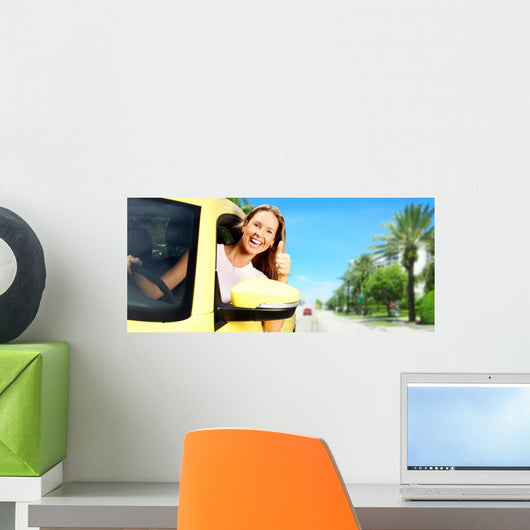 Woman Driving a Yellow Car Wall Decal