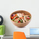 Grilled chicken salad in wooden bowl isolated on white Wall Decal