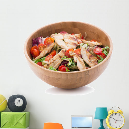Grilled chicken salad in wooden bowl isolated on white Wall Decal