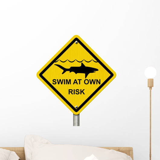 Use Caution When Swimming Because Sharks Are Present