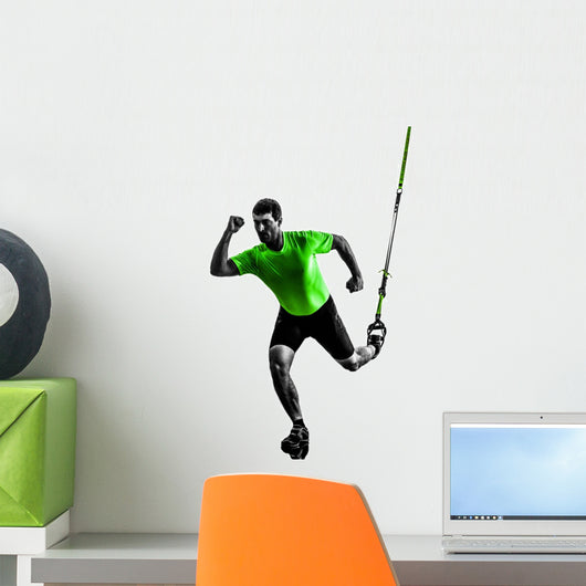 man exercising suspension training trx silhouette