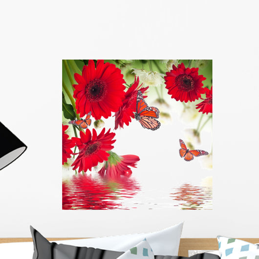 Multi-colored gerbera daisies and butterfly