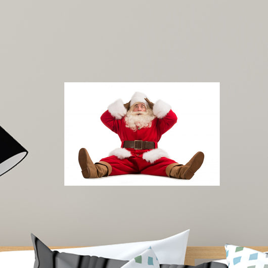 Hilarious and funny Santa Claus confused while sitting