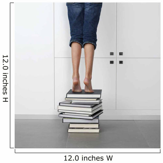 teenage girl standing on top of a stack of books Wall Mural