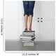 teenage girl standing on top of a stack of books Wall Mural