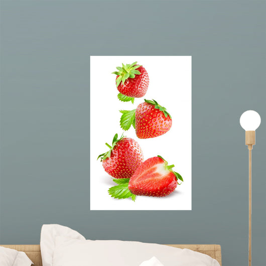 Falling Strawberries Isolated on a White Background