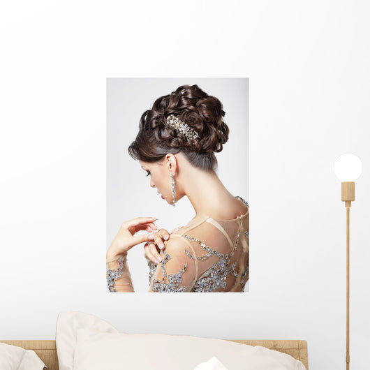 Elegance. Chic. Beautiful Brunette with Classy Hairstyle. Luxury