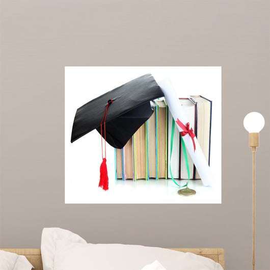 Medal for achievement in education with diploma, hat and books
