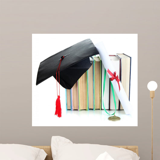 Medal for achievement in education with diploma, hat and books