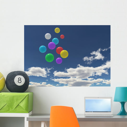 Balloons in the blue sky Wall Mural
