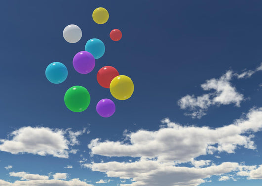 Balloons in the blue sky Wall Mural