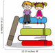 kids sitting on books