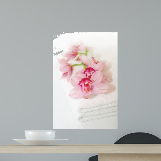 White towels with orchids