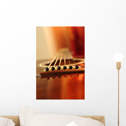 Acoustic guitar bridge and strings close up Wall Mural