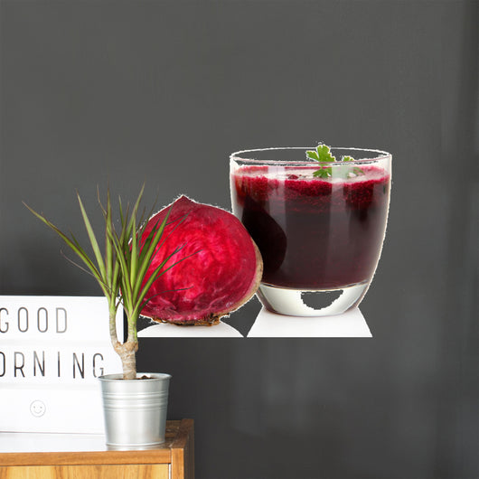 Fresh juice of beets isolated on white
