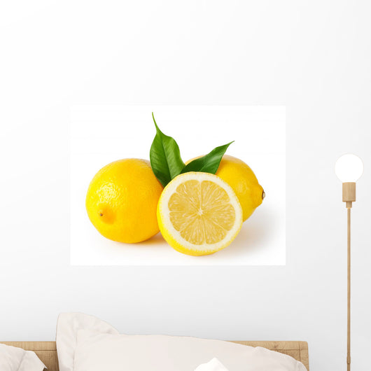 Three lemons with leaves