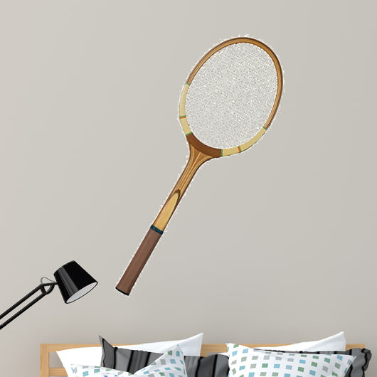 Old wooden tennis racket isolated on white background