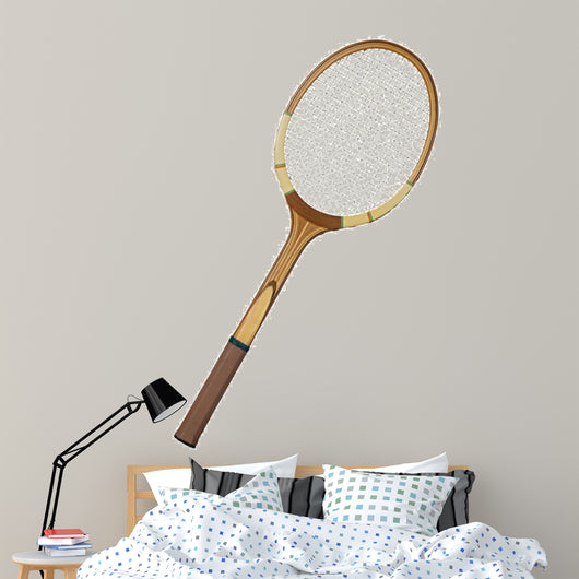 Old wooden tennis racket isolated on white background