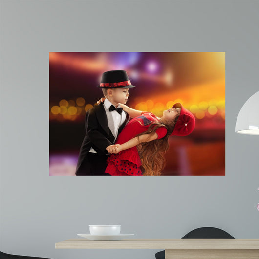 Lovely little boy and girl dancing