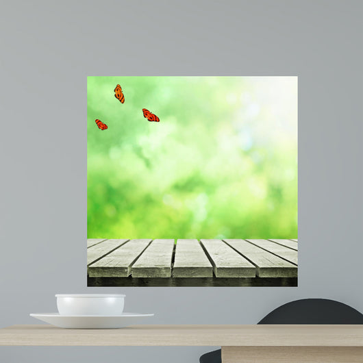 Path in field with flyinf butterflies