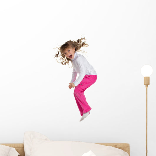 happy little girl jumping Wall Decal