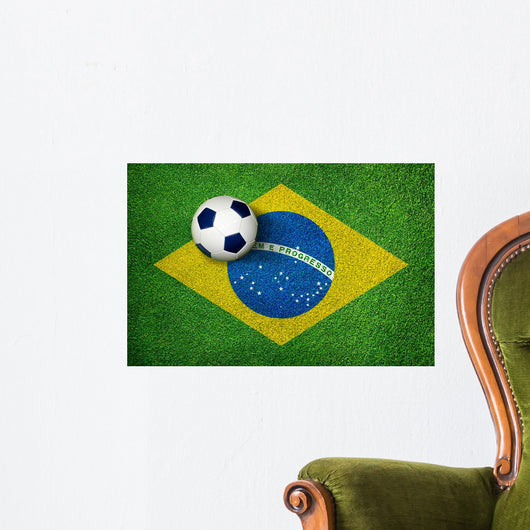 2014 - football on grass field with flag Wall Mural
