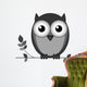 Wise owl on branch isolated on white background Wall Decal