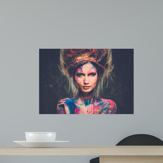 Young woman muse with creative body art and hairdo