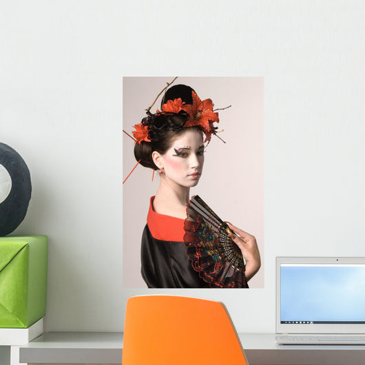 The young Japanese woman on a grey background Wall Mural