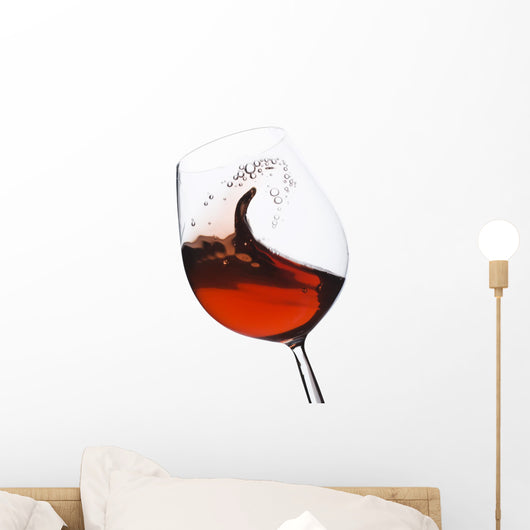 Isolated moving (motion blur) red wine glass Wall Decal