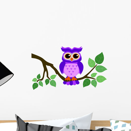 Cute Owl Sitting on a Branch
