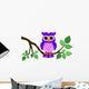 Cute Owl Sitting on a Branch