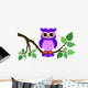 Cute Owl Sitting on a Branch