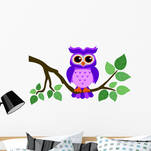 Cute Owl Sitting on a Branch