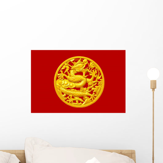 Golden Chinese dragon on red wood background